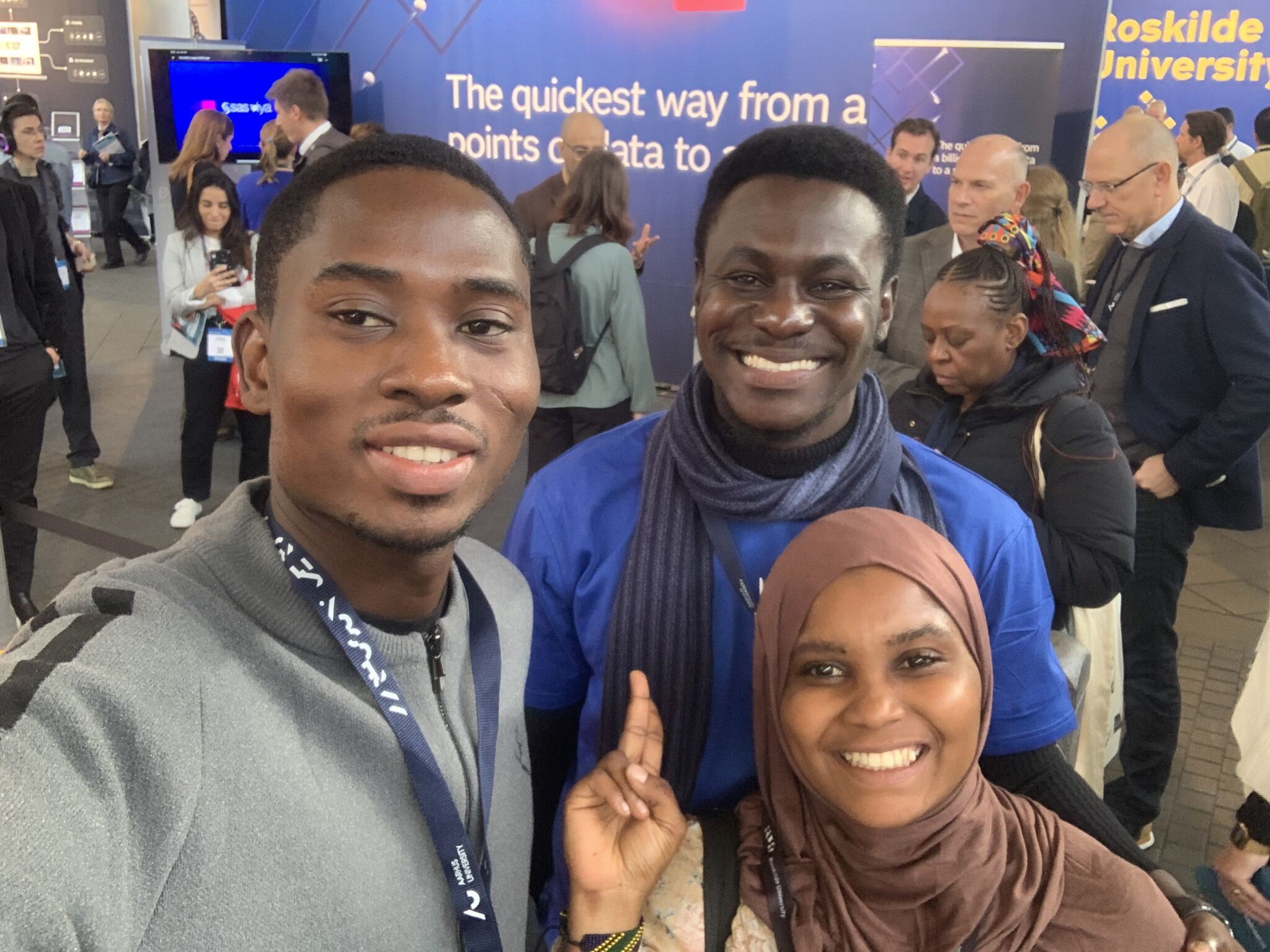 Christopher Naya (left) with his peers at the conference