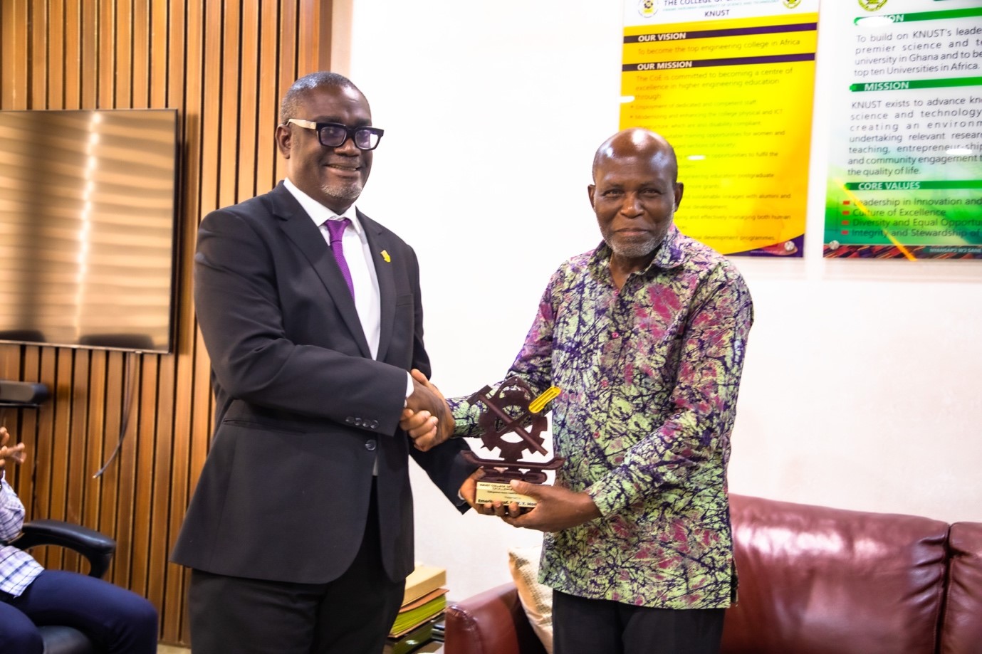 Prof. Kwabena Biritwum Nyarko, Provost of the College of Engineering, presented the award to Emeritus Professor Francis Momade.