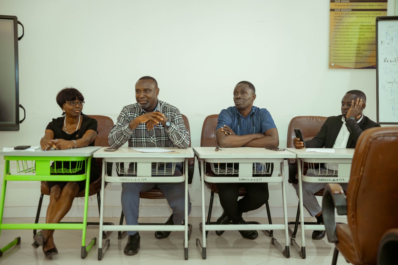 Dr. Paul Kwadwo Addo with the three faculty registrars