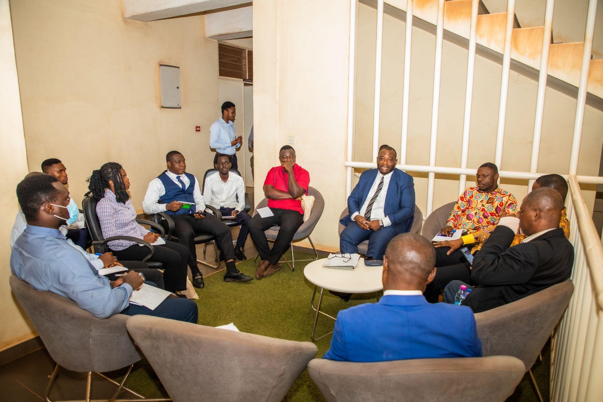 Picture of representatives of the various agencies in a group discussion