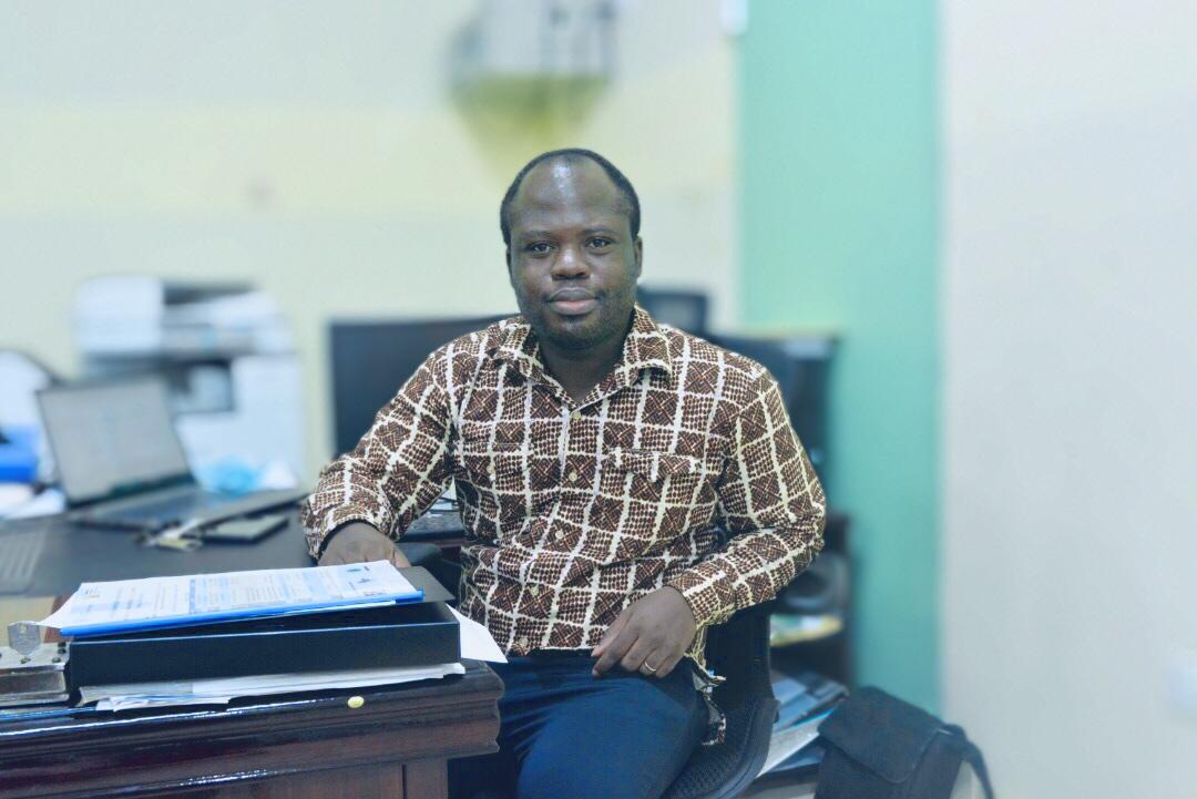 Dr. Richard Opoku, Lecturer at the Mechanical Engineering Department explaining some innovations in the solar laboratory.